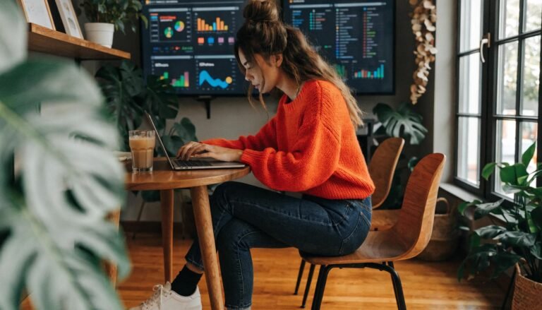 Local business owner analyzing Google Local Ads performance in a modern workspace